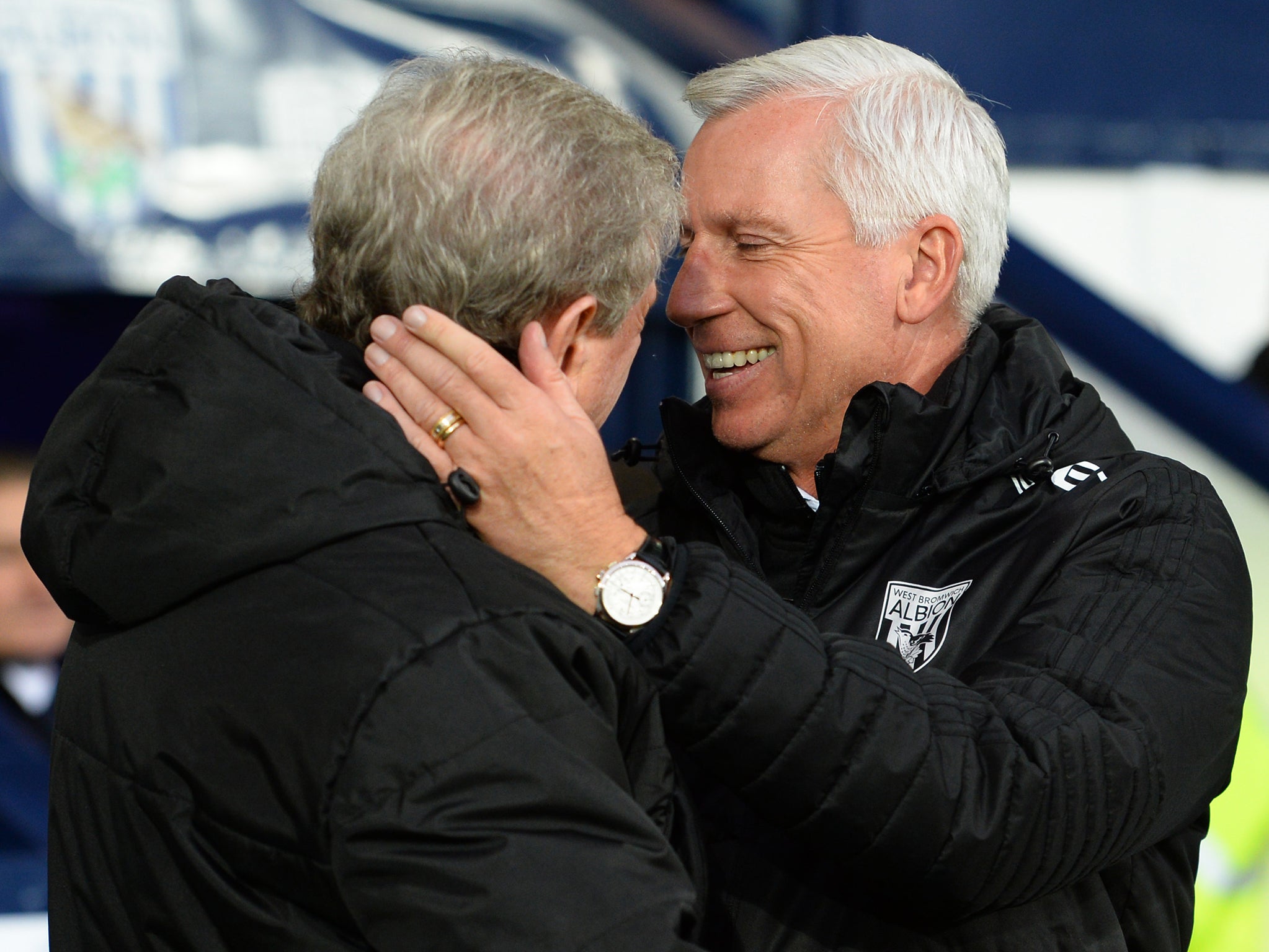 Hodgson and Pardew shake hands before the match