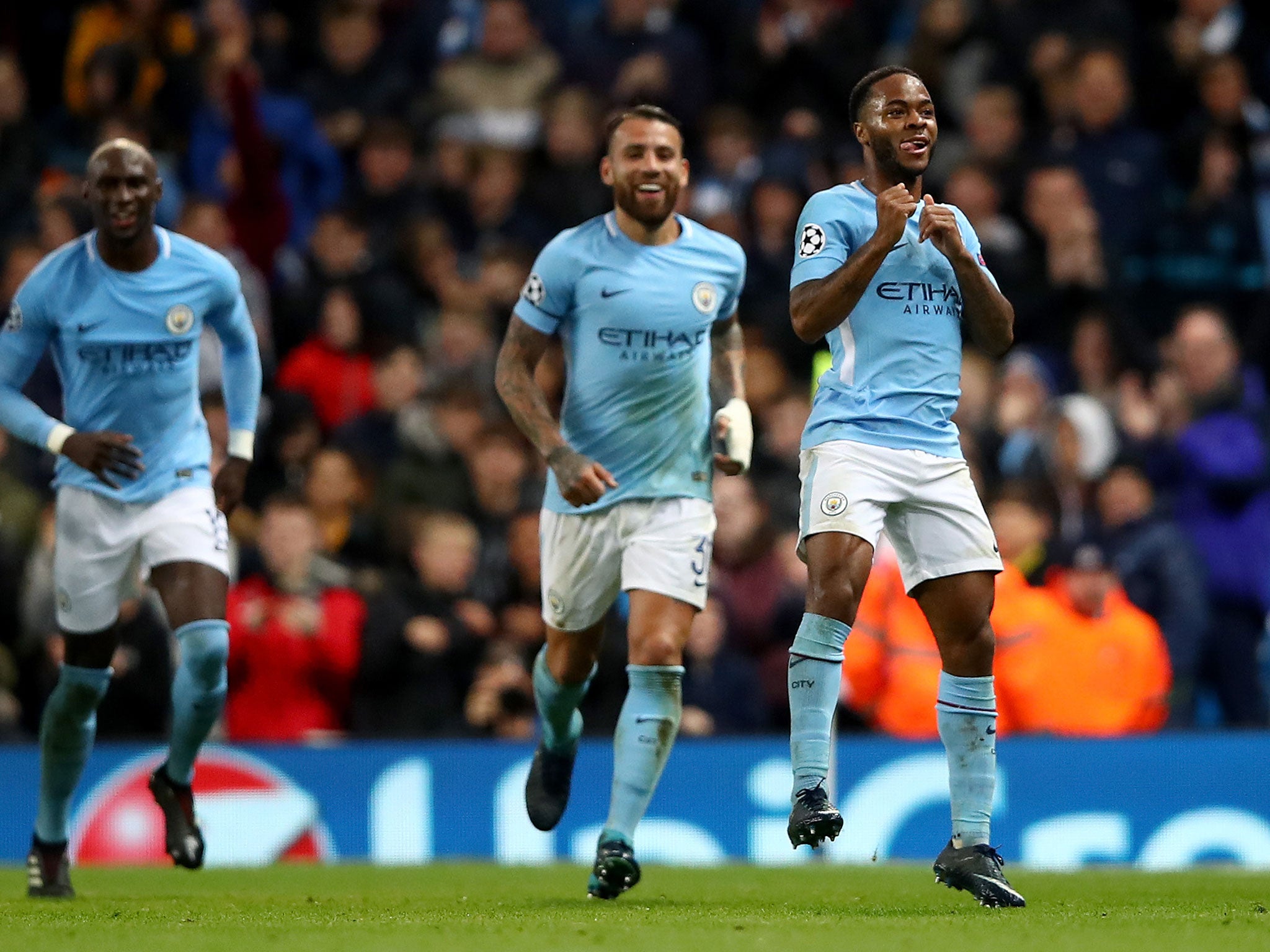 Raheem Sterling celebrates scoring for City in their group game Feyenoord last month