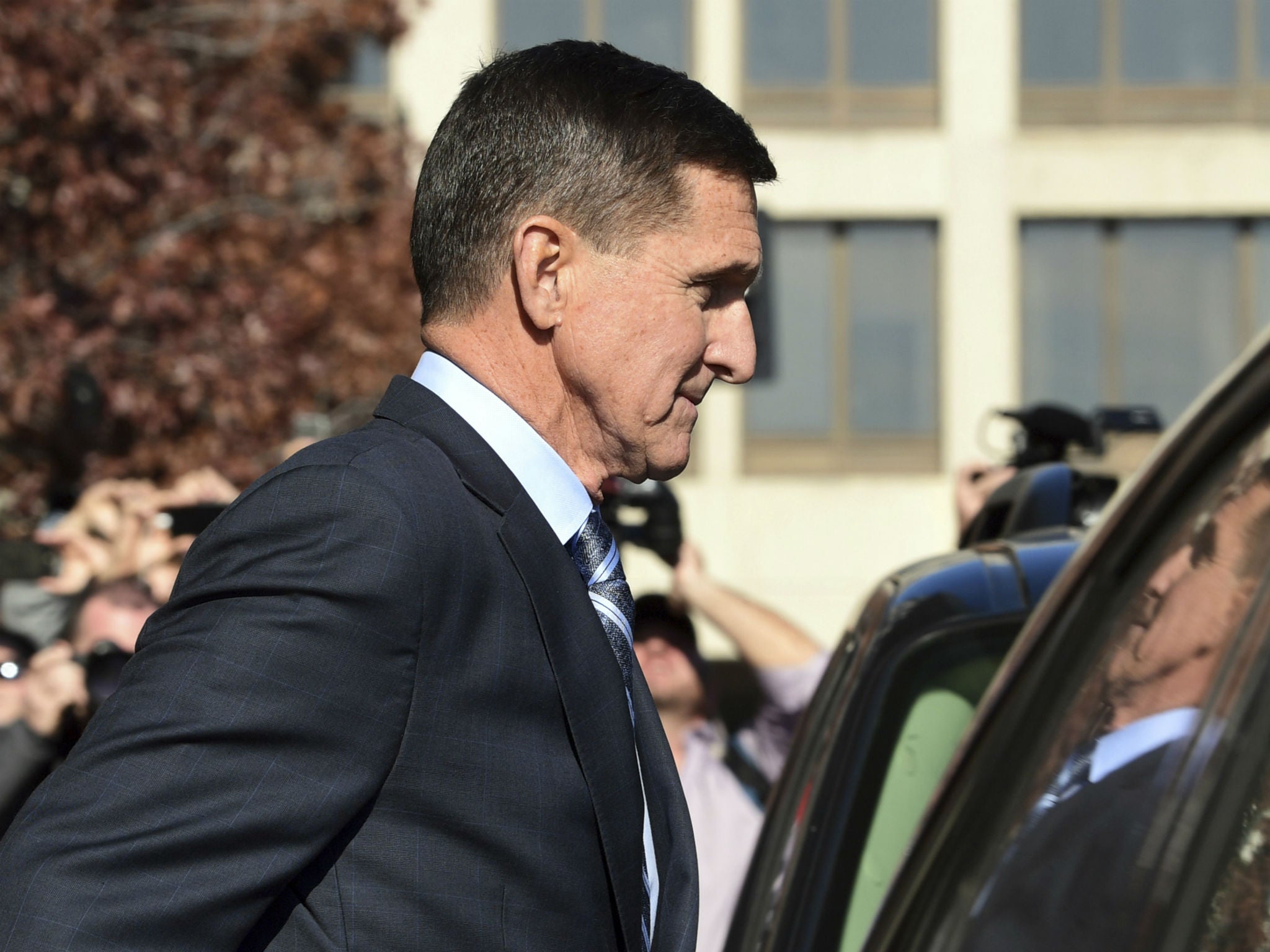 The charging of Michael Flynn, seen here leaving federal court in Washington, DC on Dec. 1, 2017, has rattled the White House