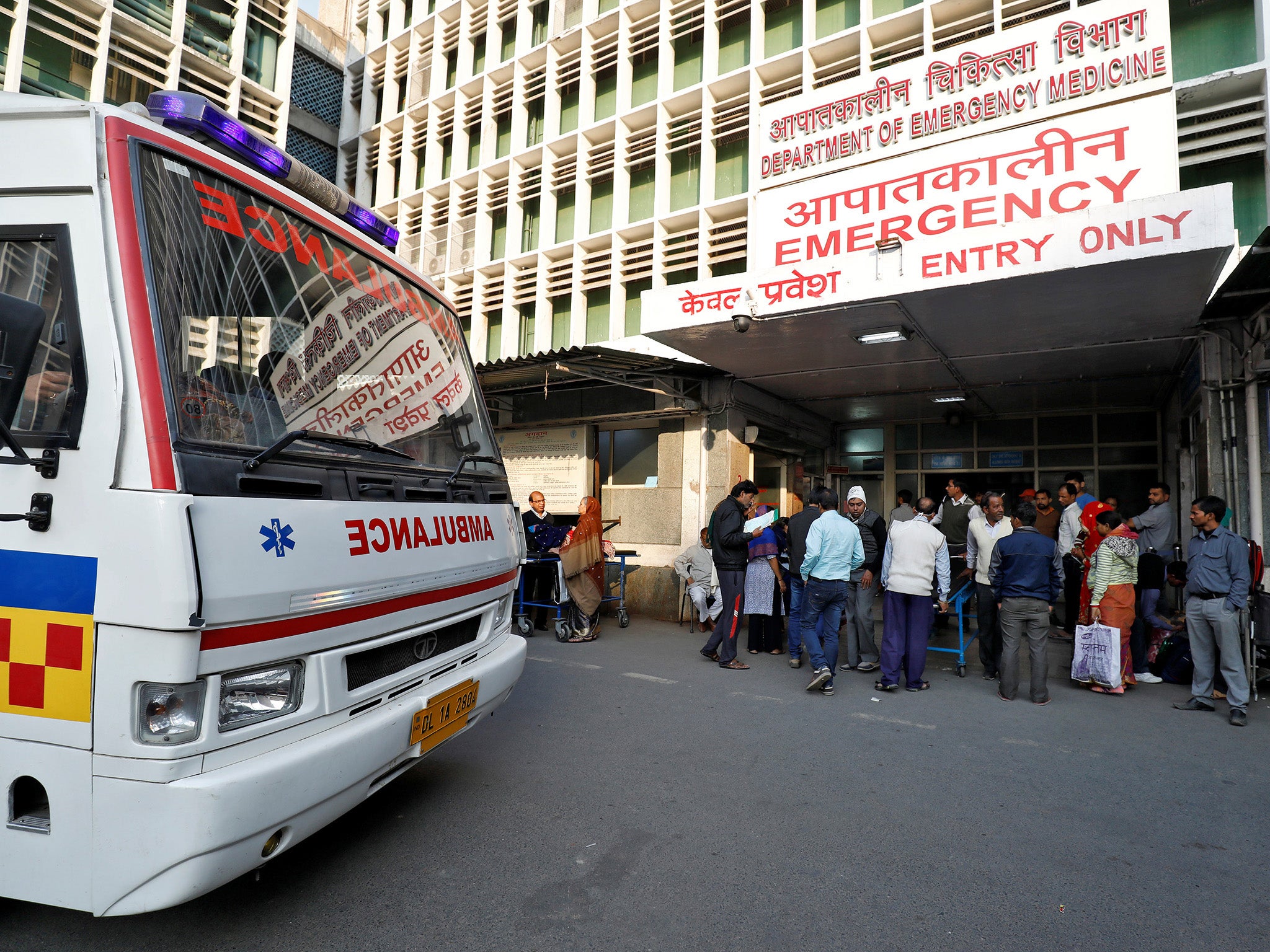 Representational purposes only. An ambulance arrives as people stand at the entrance of the emergency department of a government-run hospital in New Delhi