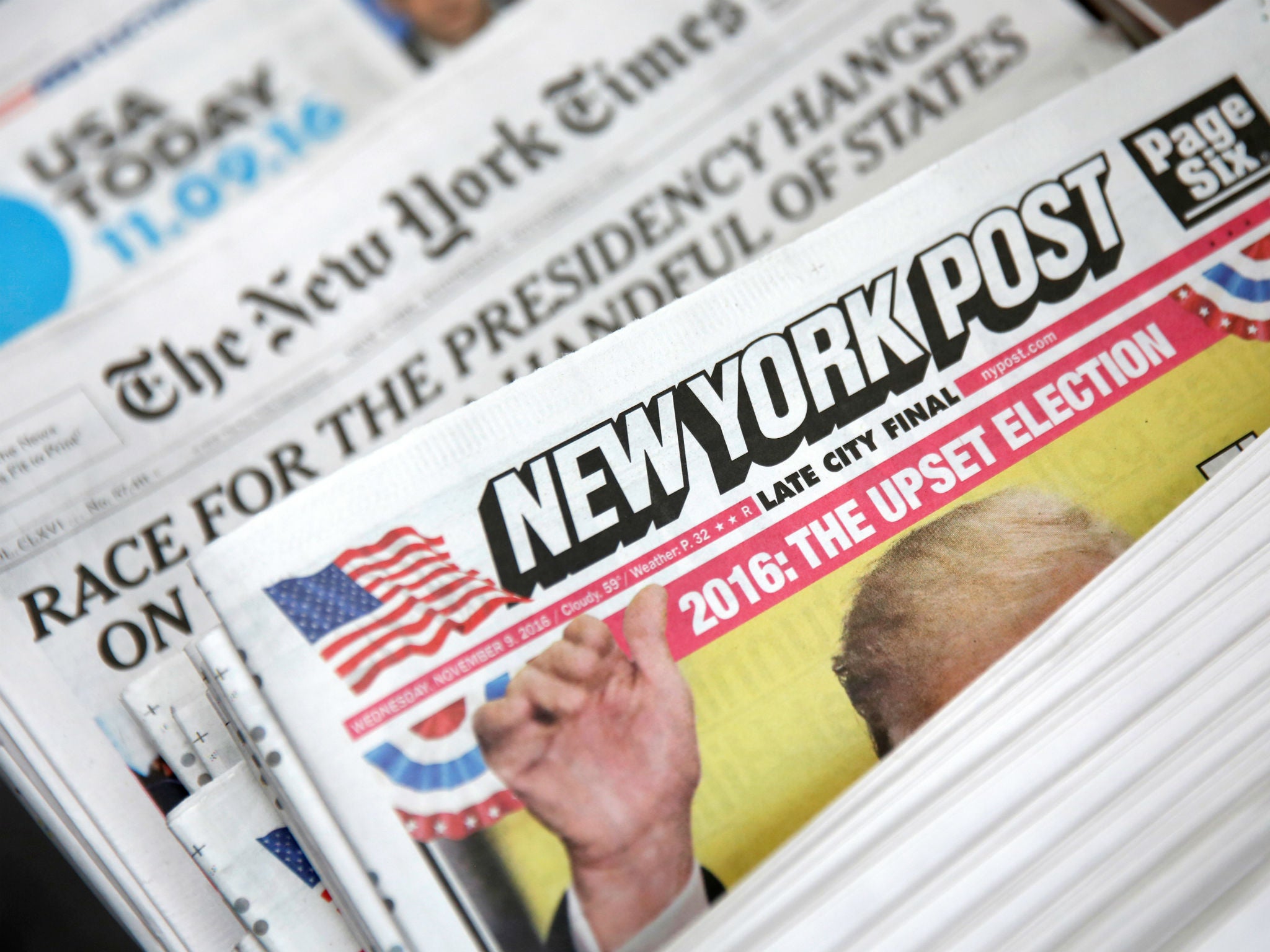While trust in the media has risen overall, many Americans embrace Donald Trump's view of reporters as the 'enemy'
