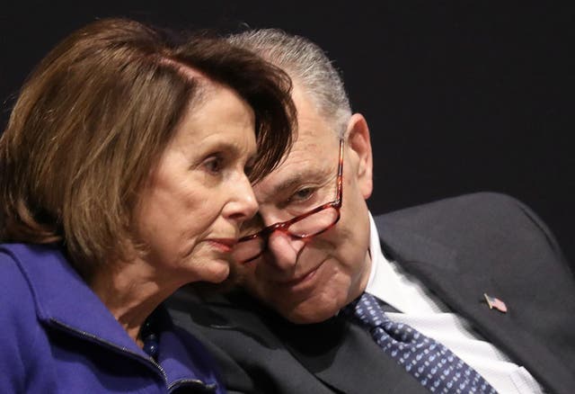 Senate Minority Leader Chuck Schumer speaks with House Minority Leader Nancy Pelosi