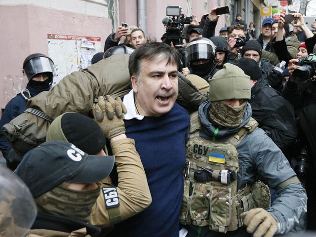 Georgian former President Mikheil Saakashvili is detained by officers of the Security Service of Ukraine on Tuesday morning