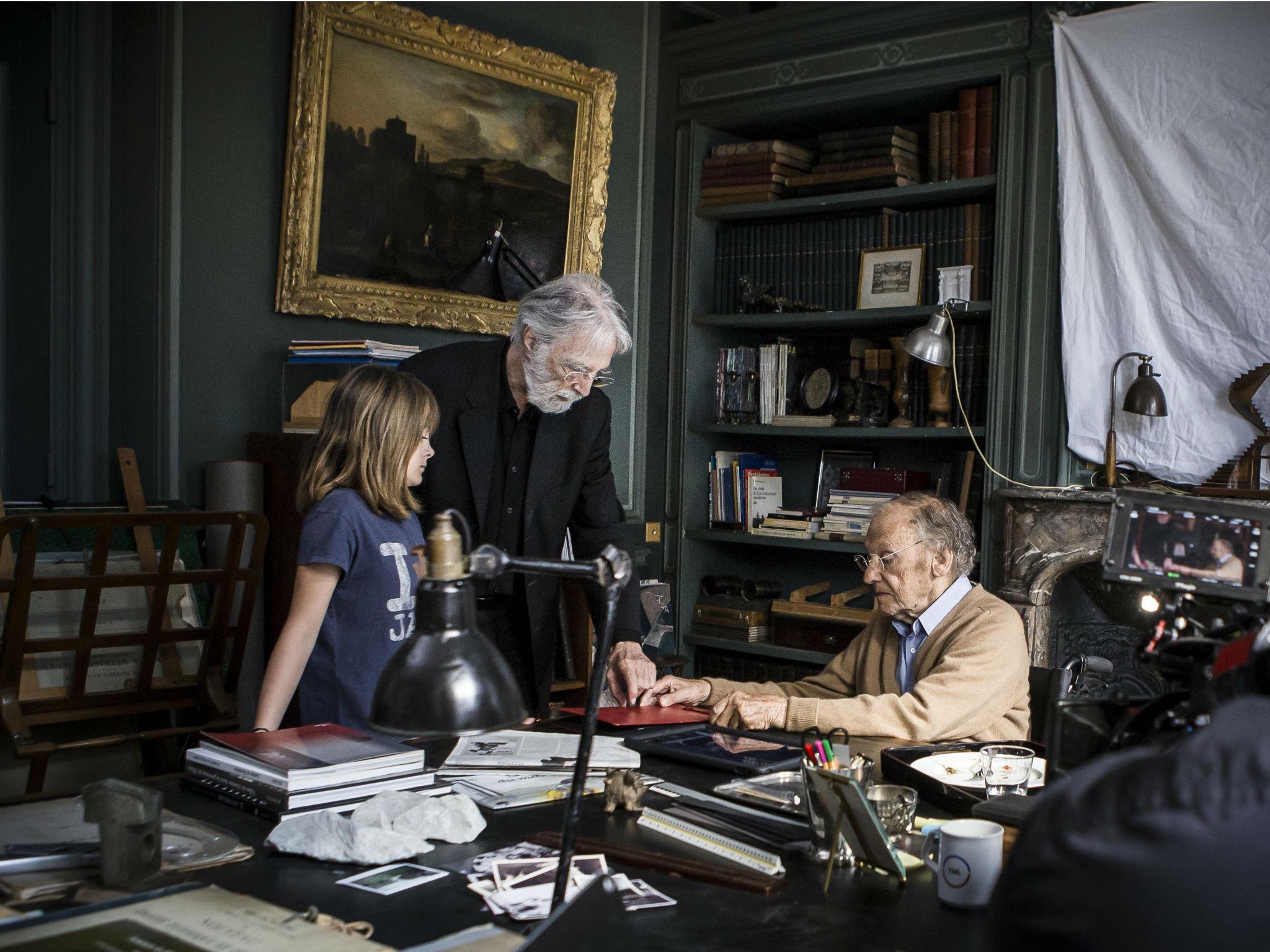 Haneke (centre) on set of his new film ‘Happy End’ with Jean-Louis Trintignant as Georges Laurent who has a beautifully intimate conversation with his granddaughter Eve, played by Fantine Harduin