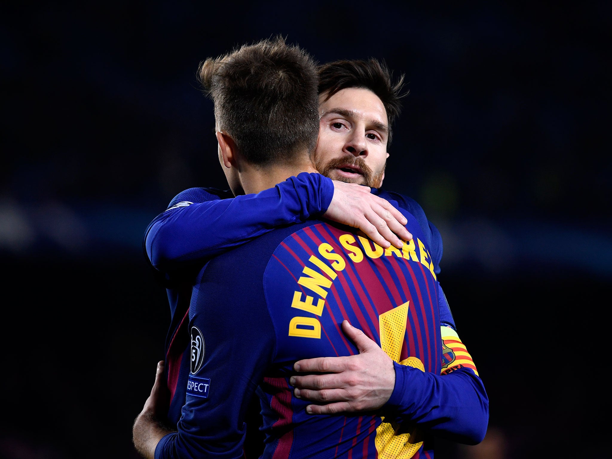 Denis Suarez and Lionel Messi of Barcelona celebrate Barcelona's second goal