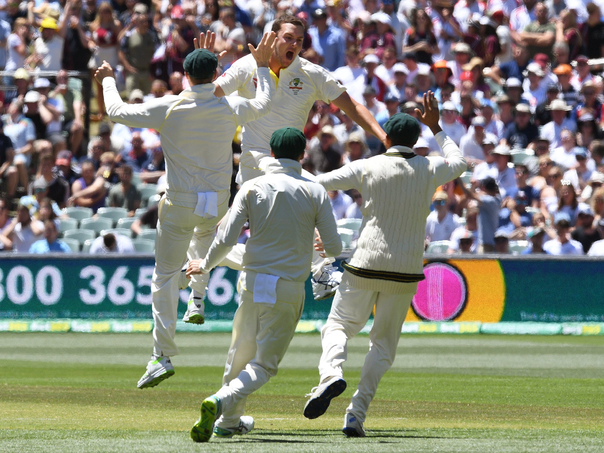 Josh Hazlewood celebrates taking the wicket of Joe Root on day five