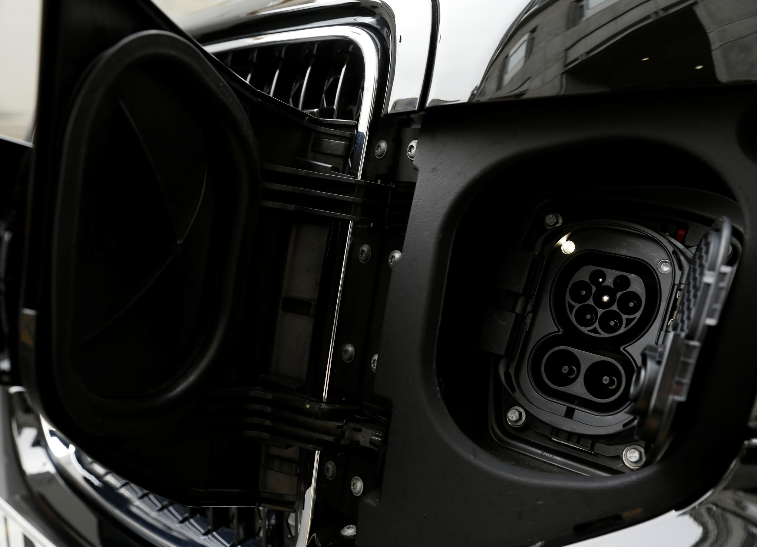 
A charging port on an electric black cab (Reuters) 