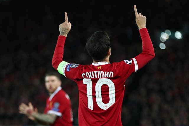 Philippe Coutinho celebrates putting Liverpool in front