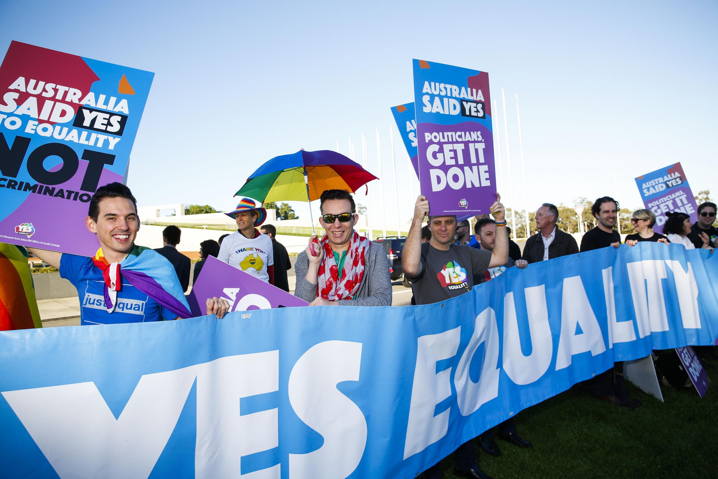 Equality campaigners gather in front of Parliament ahead of the same-sex marriage vote (AFP/Getty Images)