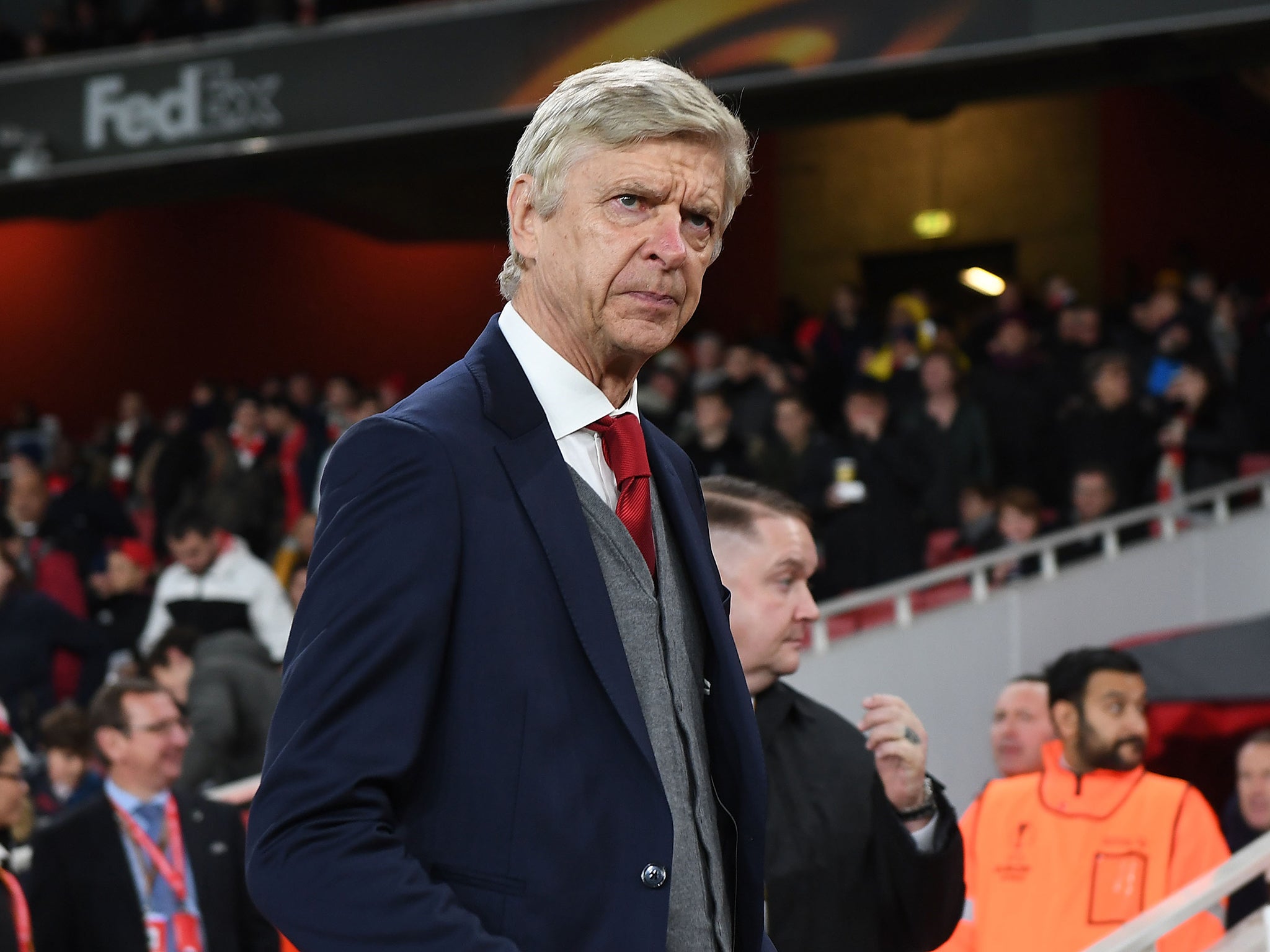 Arsene Wenger believes the lack of a competitive match kept a number of fans away from the ground