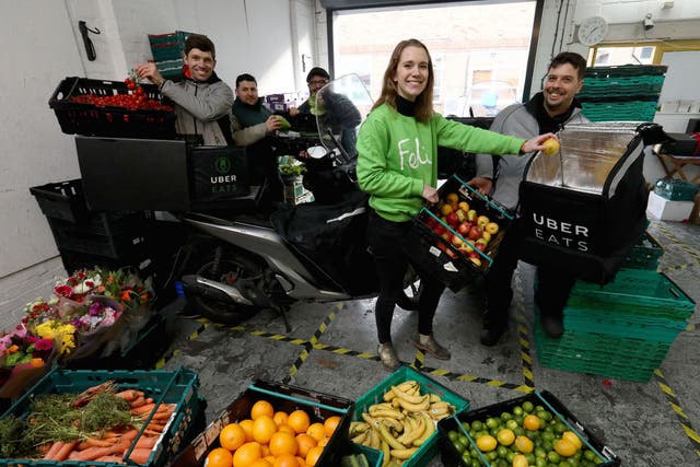 UberEATS drivers pick up food from the Felix depot to be taken to Berrymede Junior School in Acton