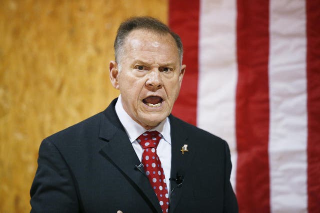 Former Alabama Chief Justice and US Senate candidate Roy Moore speaks at a campaign rally