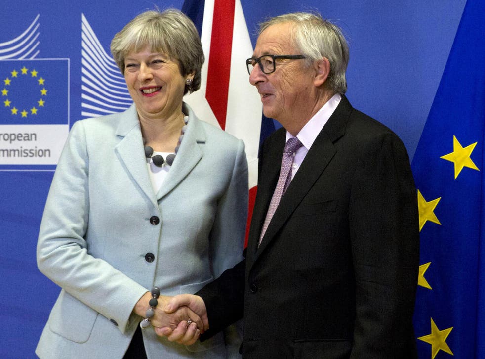 Theresa May with European Commission President Jean-Claude Juncker in Brussels on Friday