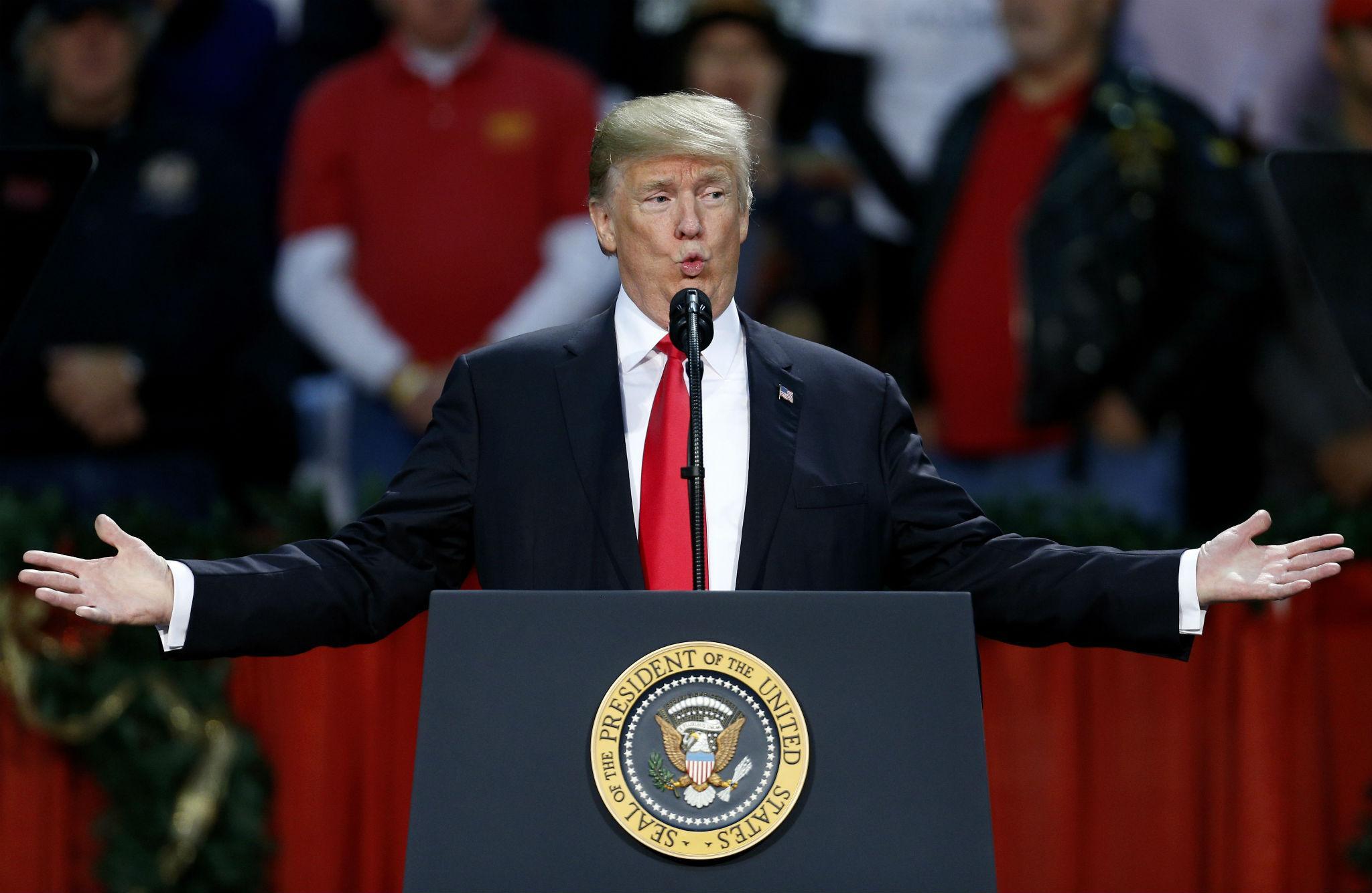 President Donald Trump speaks during a rally in Pensacola, Florida (AP Photo/Jonathan Bachman)