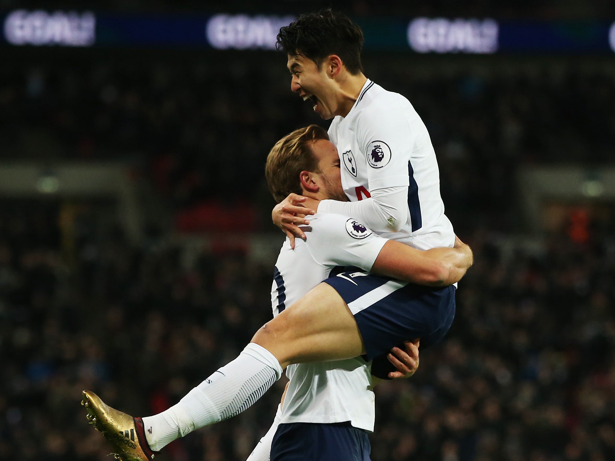 Harry Kane embraces Son Heung-min after the former scored Spurs' third goal