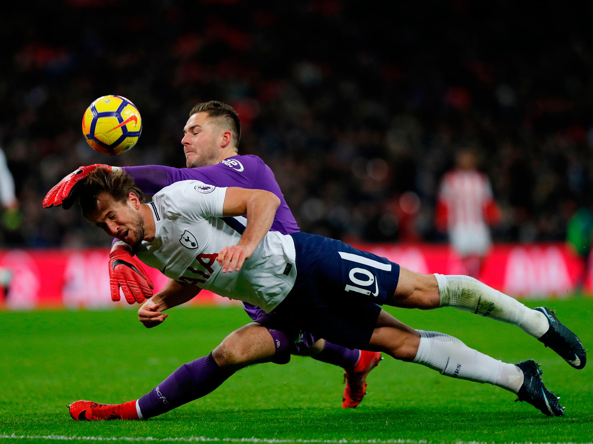 Jack Butland prevents Harry Kane from heading the ball goalbound