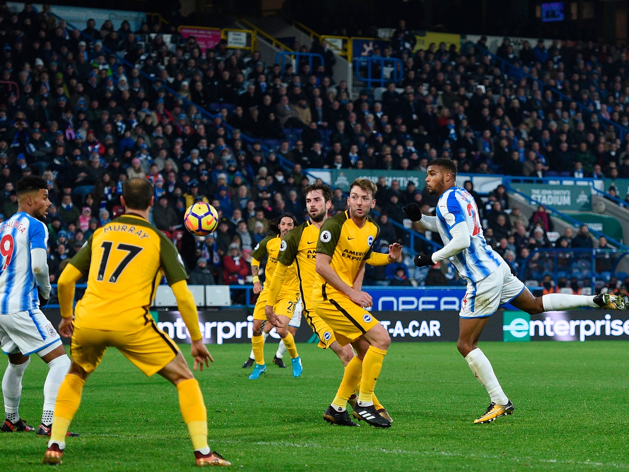 Mounie heads in his and Huddersfield's second goal
