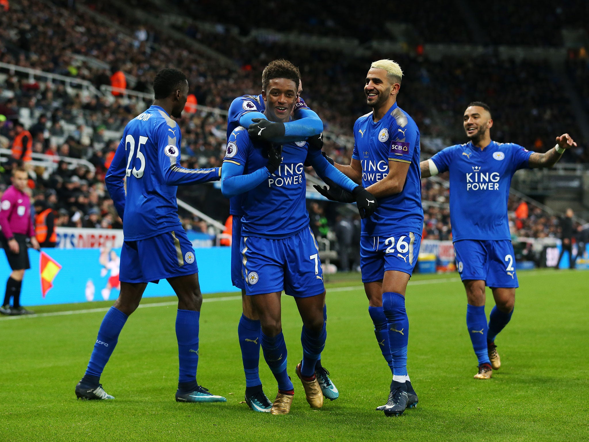 Demarai Gray celebrates with teammates after putting Leicester ahead in the second half
