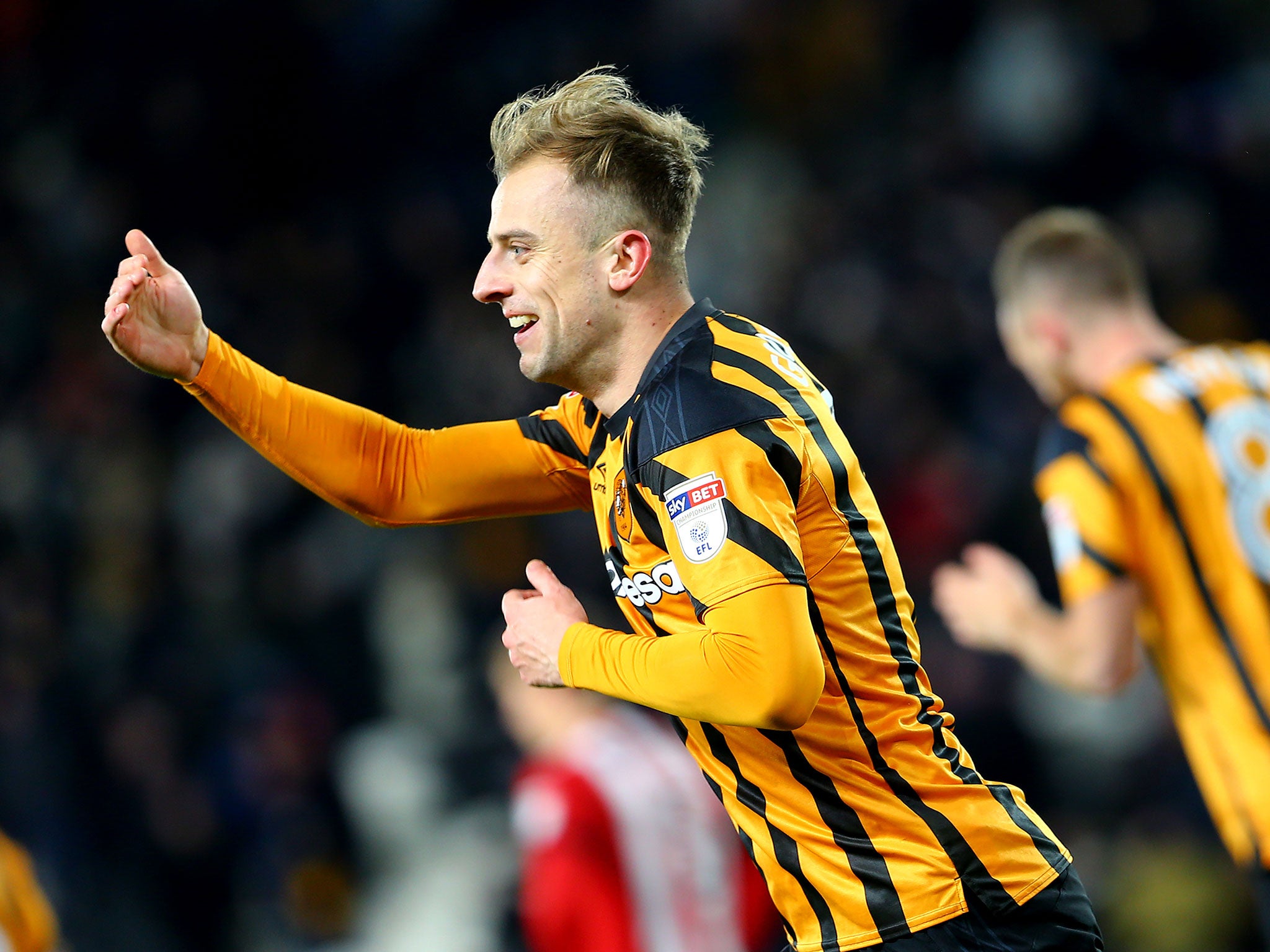 Kamil Grosicki celebrates scoring the equaliser