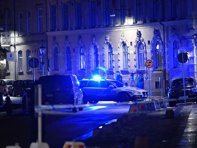 Police outside the synagogue following the failed attack in Gothenburg