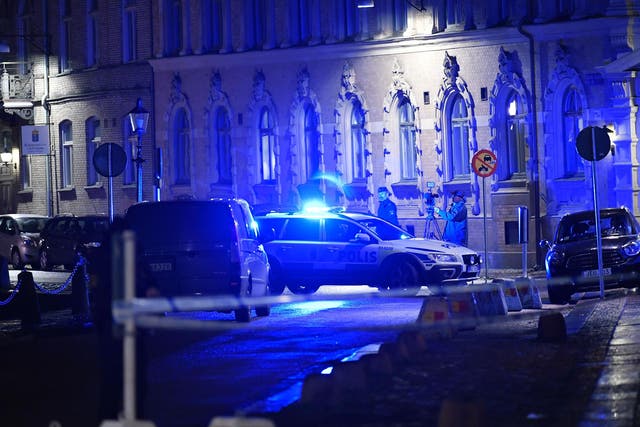 Police outside the synagogue following the failed attack in Gothenburg