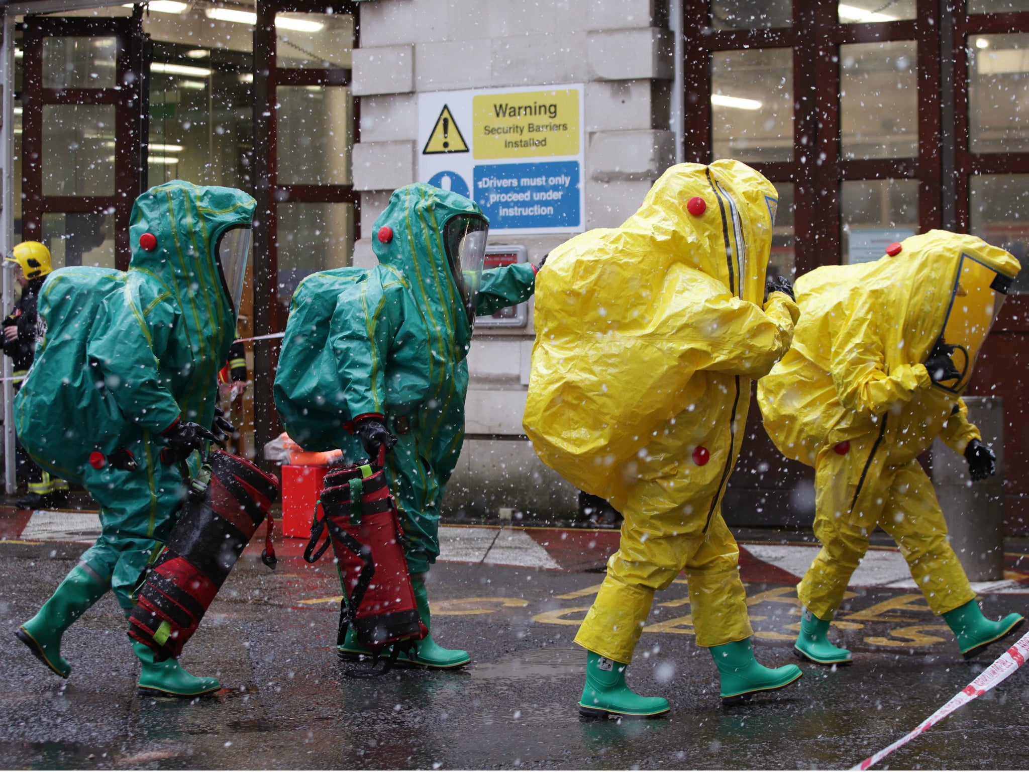 Members of the police, fire brigade and ambulance service during a joint exercise to test their response to an incident involving a hazardous substance at the Israeli Embassy in Kensington, London.