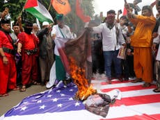 Hardline Muslims burn Israeli flags over Trump's Jerusalem decision
