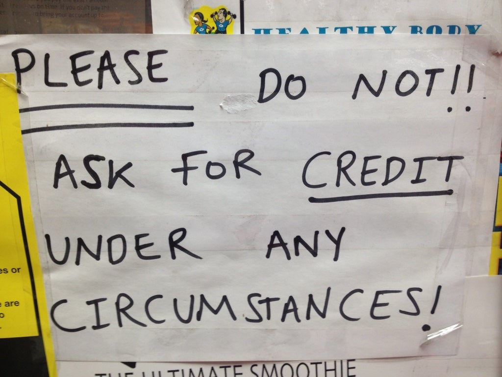 A sign in a corner shop close to a food bank in the northwest