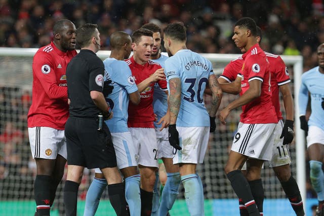 Manchester United and Manchester City players clashed after a fiery derby