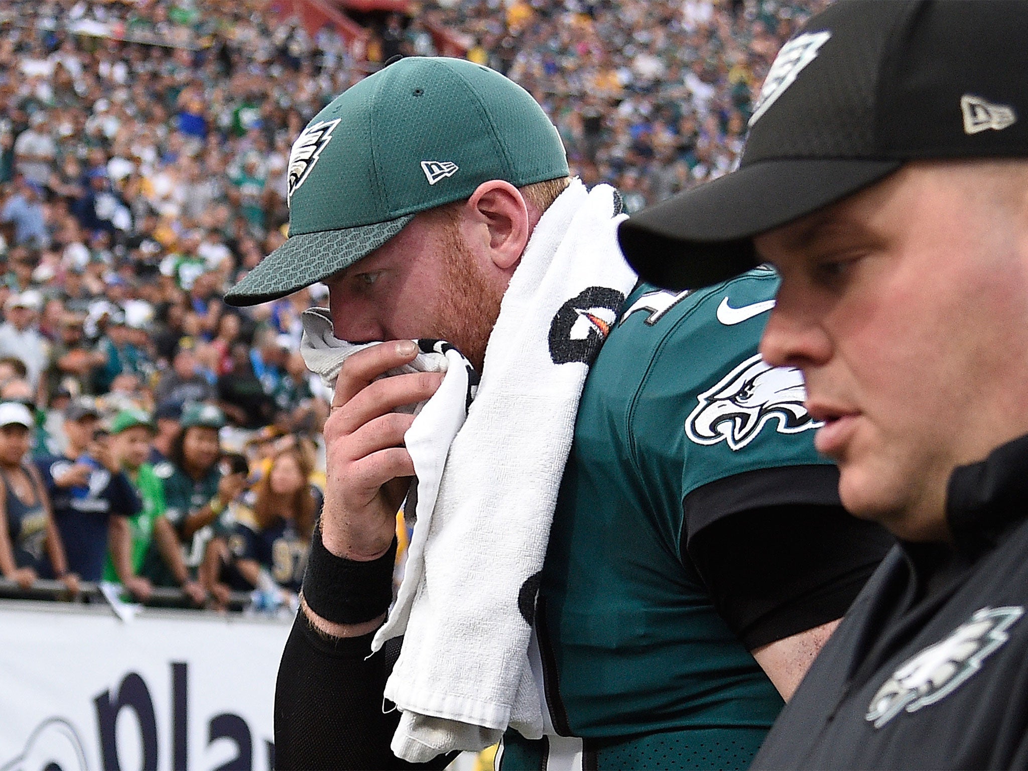 Carson Wentz leaves the field, ending a season in which he has been the league's standout player
