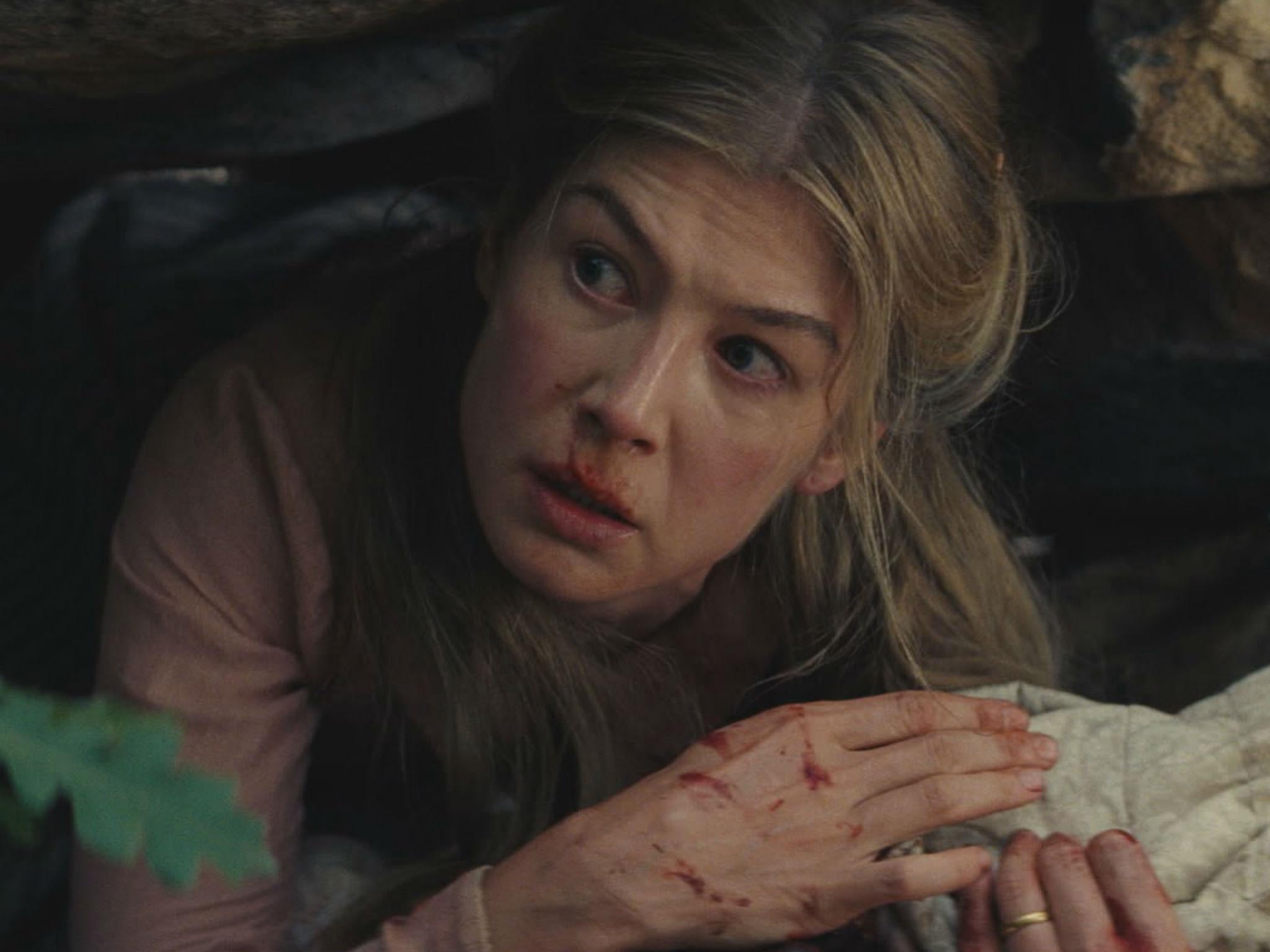 Rosamund Pike stars as a frontierswoman out west in Scott Cooper's introspective western 'Hostiles'