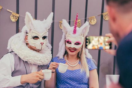 Stoned guests don the whimsical costumes provided by Eriksen at the White Rabbit Tea Party (Instagram)