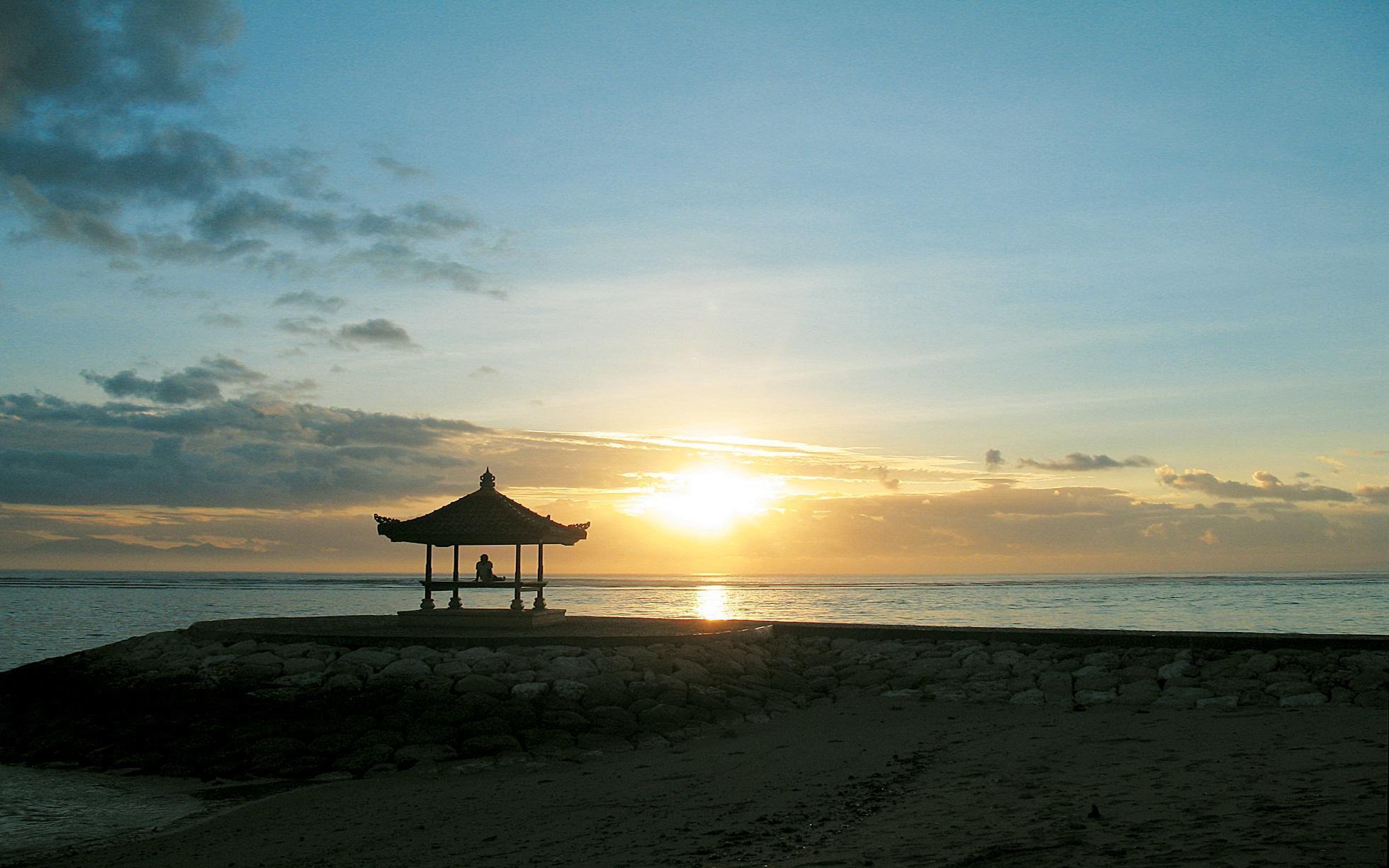 Take in the glorious sunset at Sanur Beach on Bali