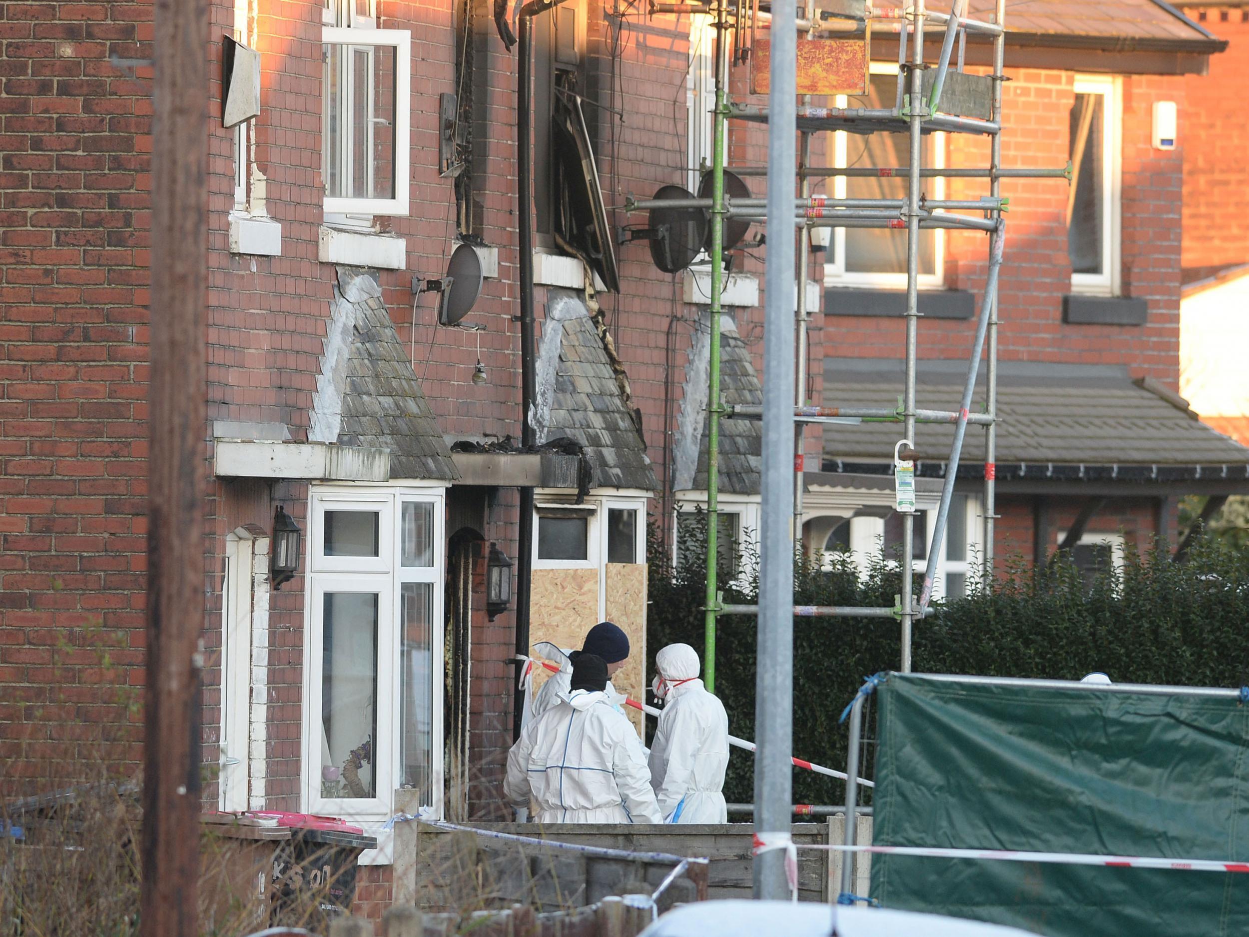 Forensic officers at the scene of the house fire Walkden, Salford