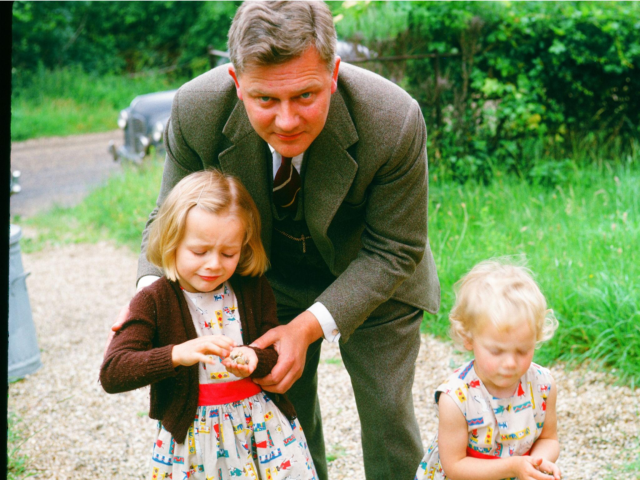Adams with his daughters Juliet (left) and Ros (right), whom he used to entertain with his stories on car journeys or at bedtime