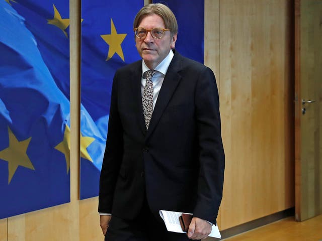 Guy Verhofstadt arrives at a meeting on Brexit with European Commission President Jean-Claude Juncker at the EU Commission headquarters in Brussels
