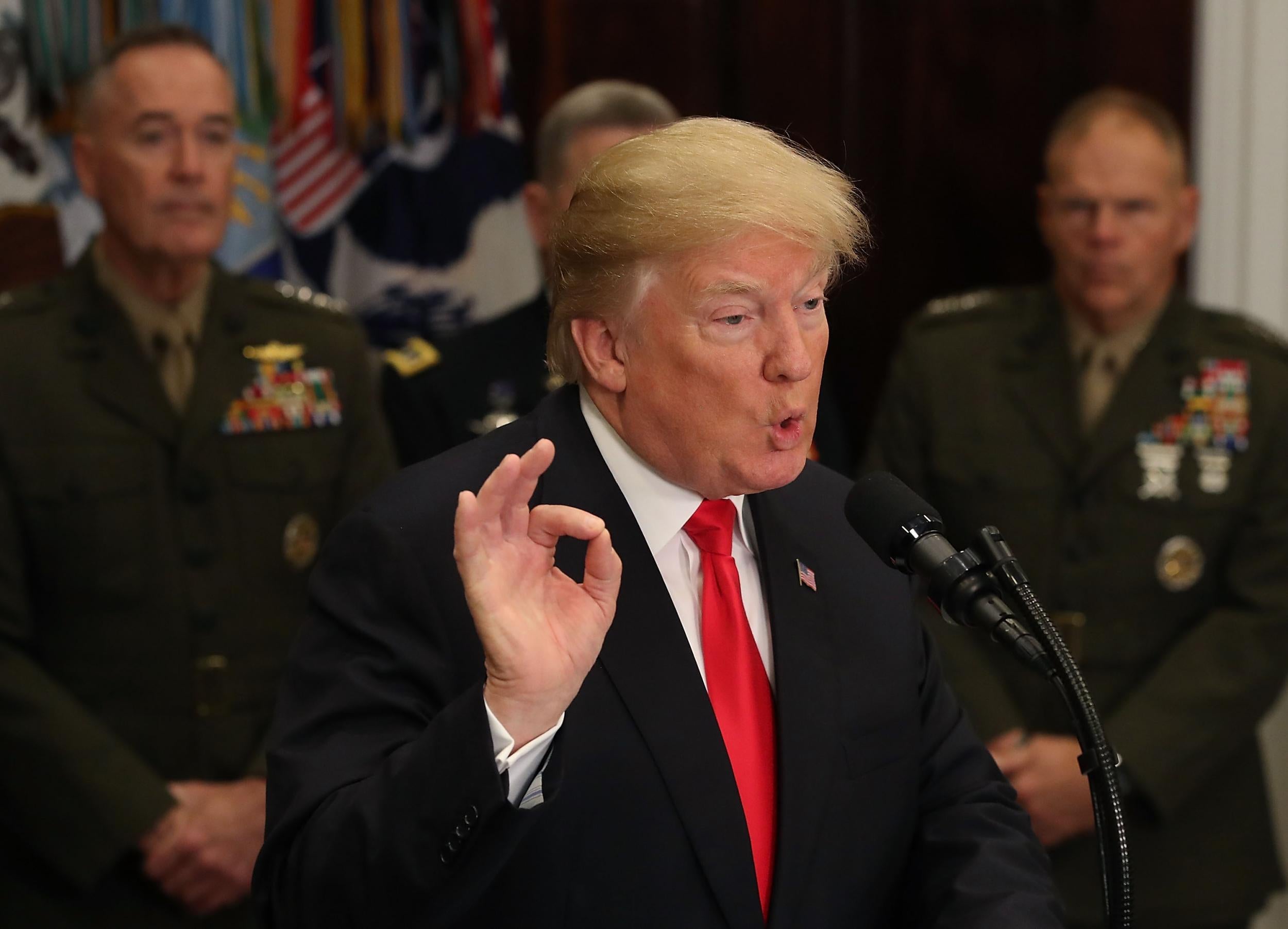 President Donald Trump speaks before signing the HR 2810, National Defense Authorization Act