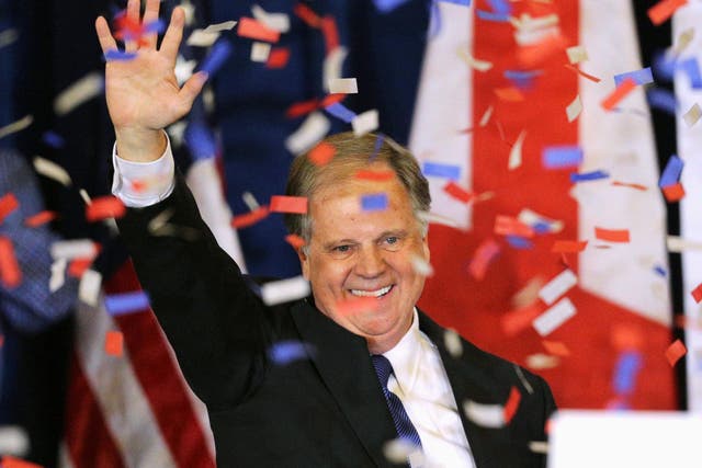 Democratic Alabama US Senate candidate Doug Jones acknowledges supporters at the election night party in Birmingham, Alabama
