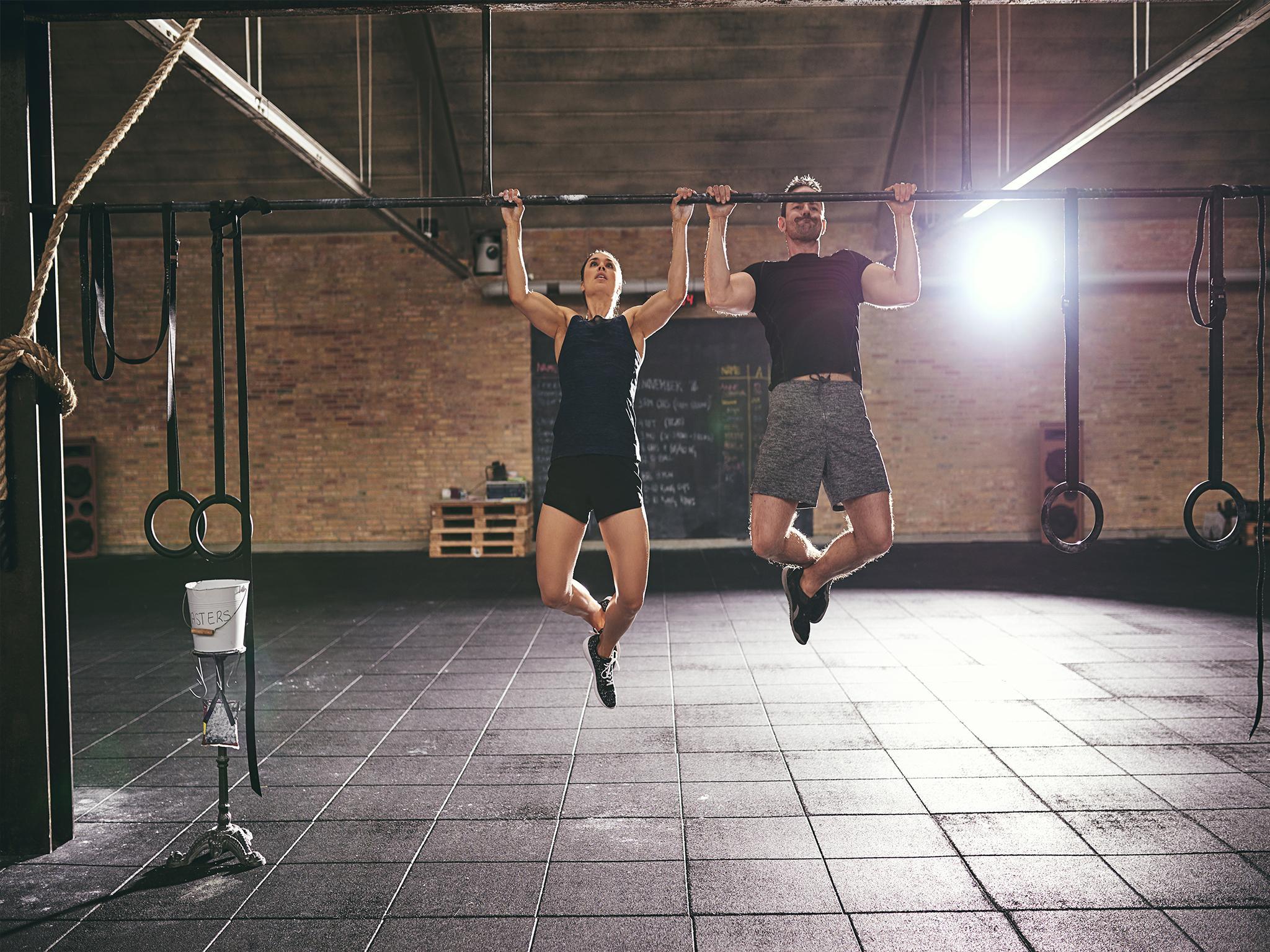 Pull-ups work the back, rear shoulders and arms Shutterstock