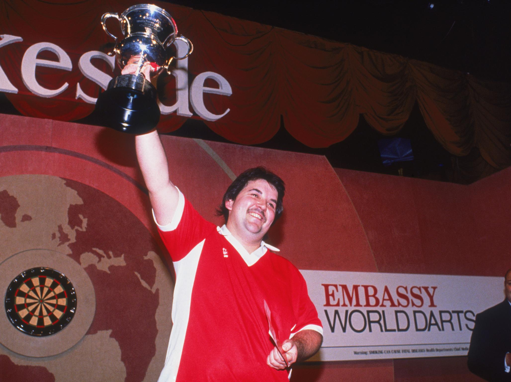 Taylor winning the 1995 Embassy World Darts championship