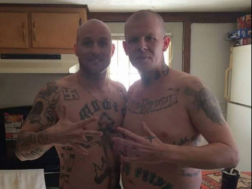 This Facebook photo appears to show Shawn White (R) making a white supremacist gang hand symbol