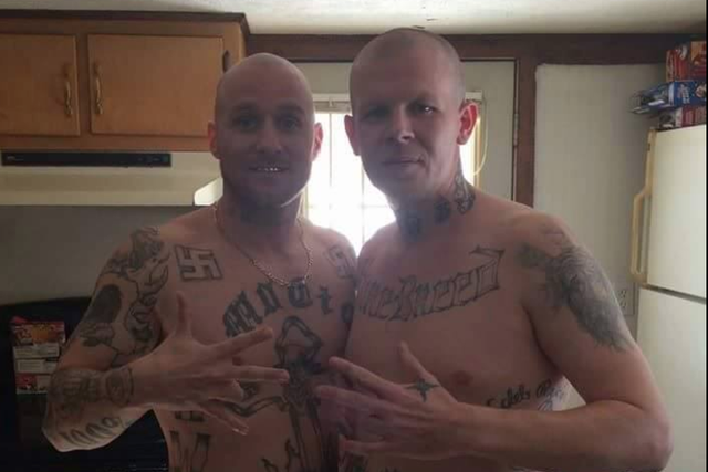 This Facebook photo appears to show Shawn White (R) making a white supremacist gang hand symbol