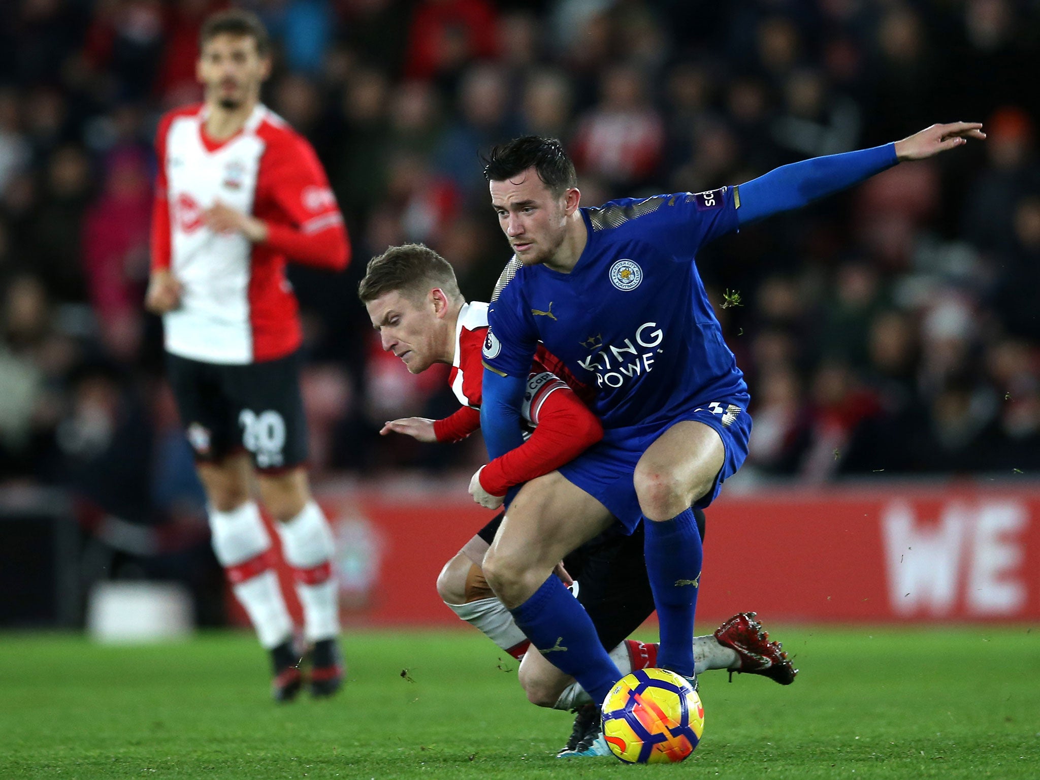 Ben Chilwell and Steven Davis tussle for possesion