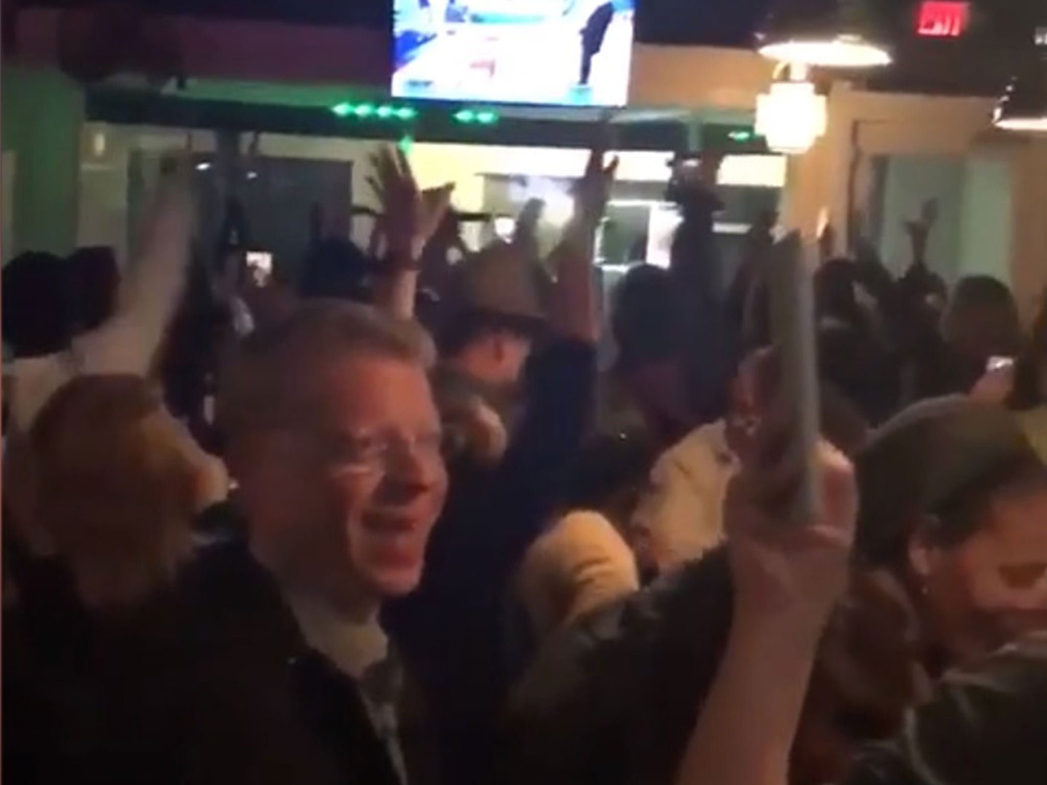 People celebrate in bar after Roy Moore loses