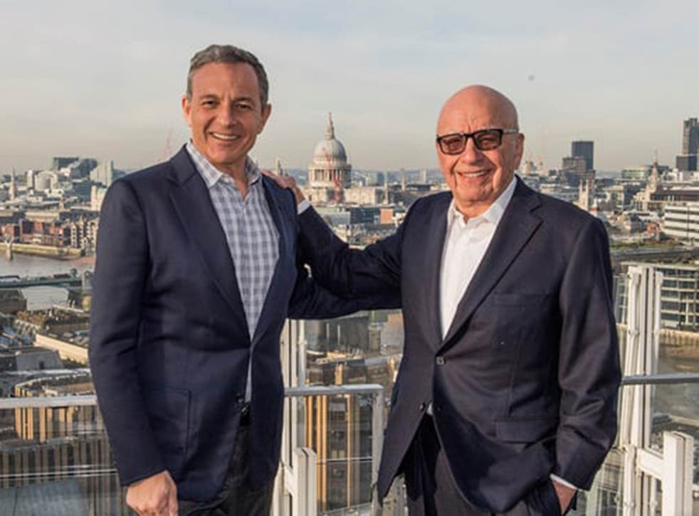 Disney chairman Robert Iger with Rupert Murdoch. The company is preparing to invest in its own streaming platform, leveraging its vast catalogue of exclusive films, TV shows and sports rights