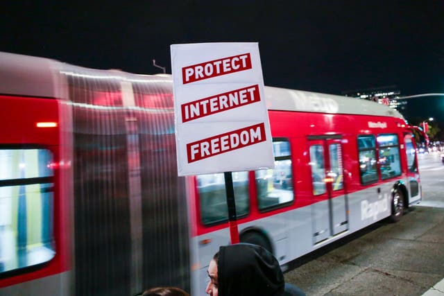 Supporter of Net Neutrality Lance Brown Eyes protests the FCC's recent decision to repeal the program in Los Angeles, California, November 28, 2017