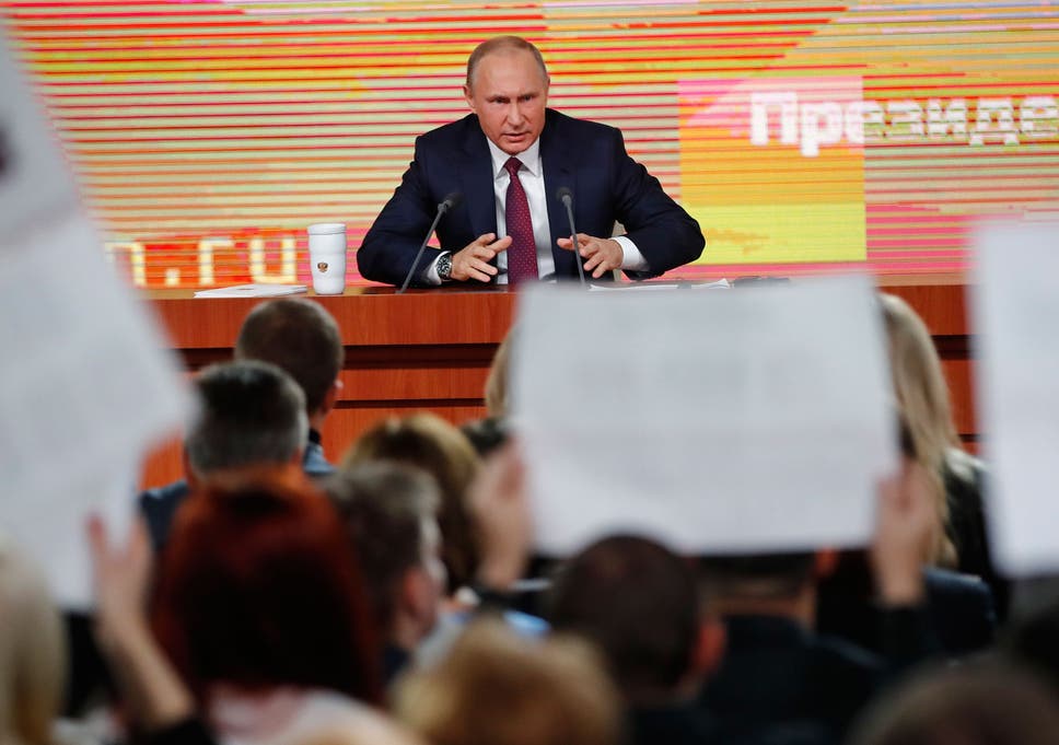 Russian President Vladimir Putin speaks during his annual news conference in Moscow