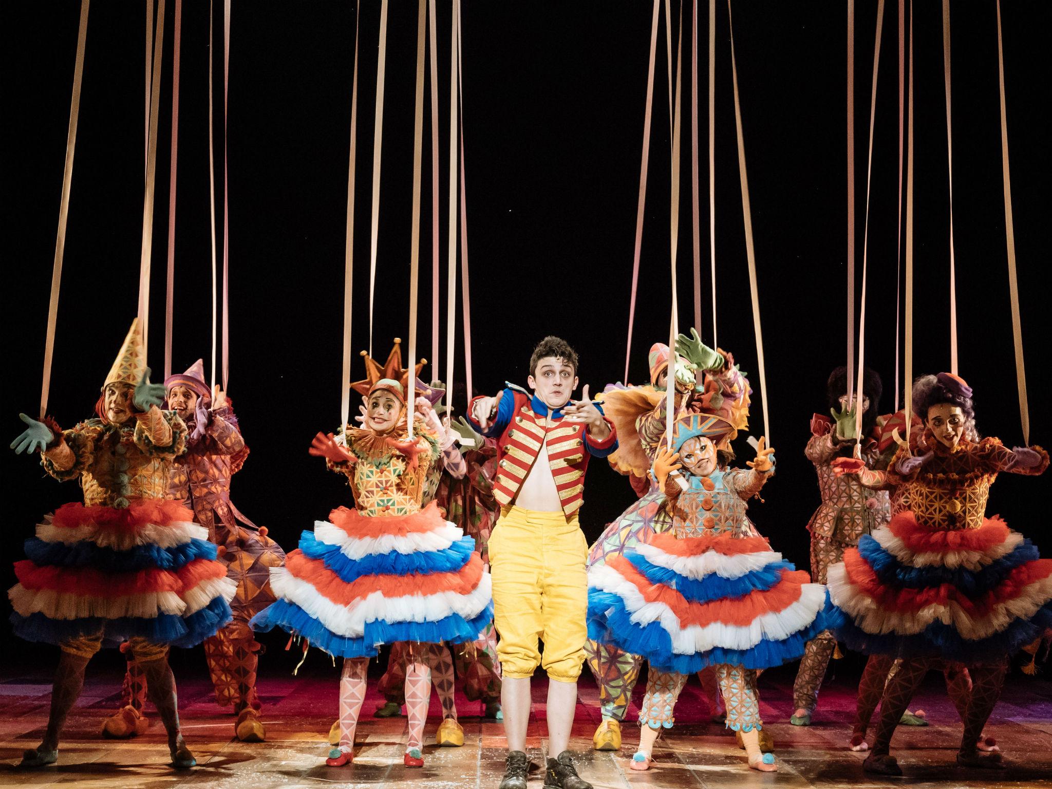 A scene from 'Pinnochio' with Joe Idris-Roberts (centre) as Pinocchio at the National Theatre