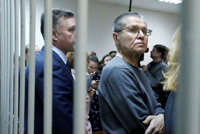 Russia's former economy minister, Alexei Ulyukayev, waits for the start of the court hearing on Friday