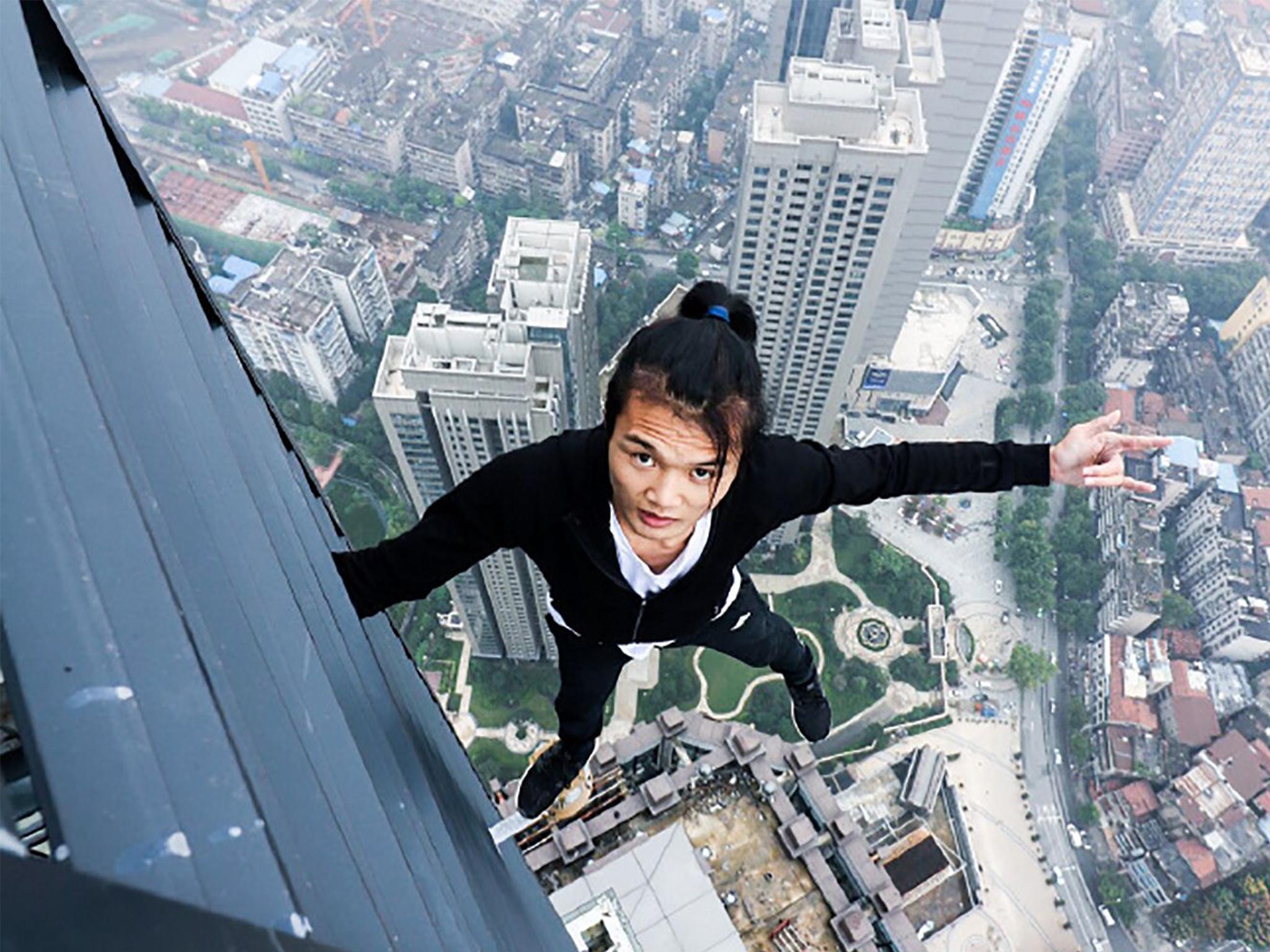 The social media star fell to his death after losing his grip from a 62 storey skyscraper in Changsa, China